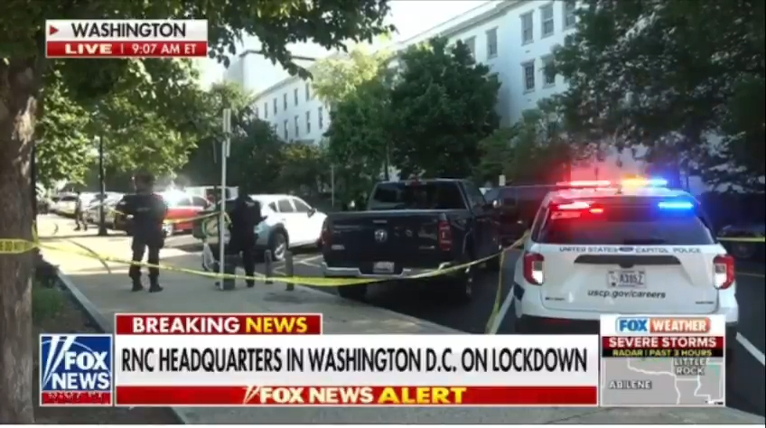 Police arrive at the RNC headquarters.