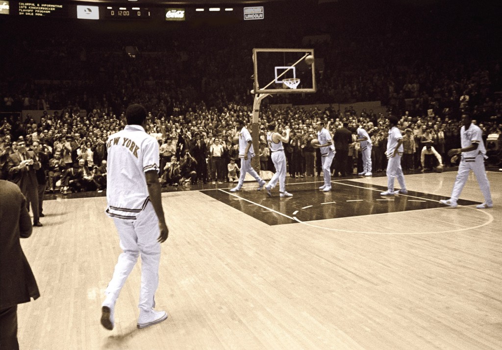 A banged-up Willis Reed walks onto the court for the Knicks' Game 7 victory over the Lakers in 1970.