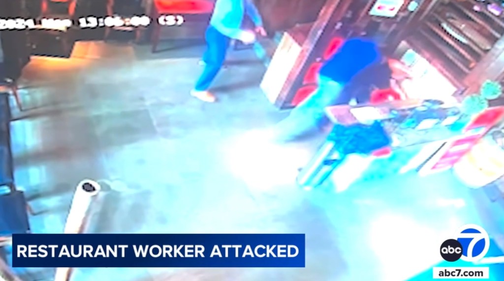 A bystander ran to help Oxlaj by grabbing the brute and pulling him away from the worker.