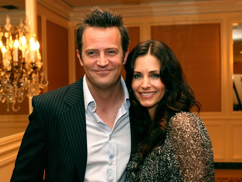 Actors Matthew Perry and Courteney Cox chatting at the AFI Associates event in Beverly Hills, California.