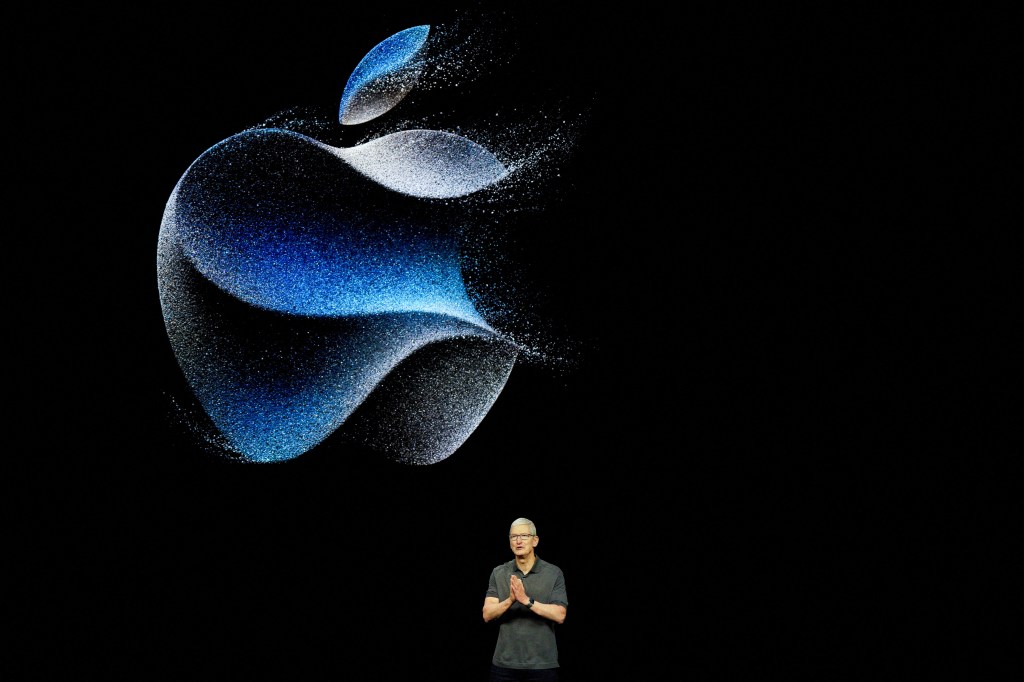 Apple CEO Tim Cook attending the 'Wonderlust' event at the company headquarters in Cupertino, California in front of a logo, September 12, 2023