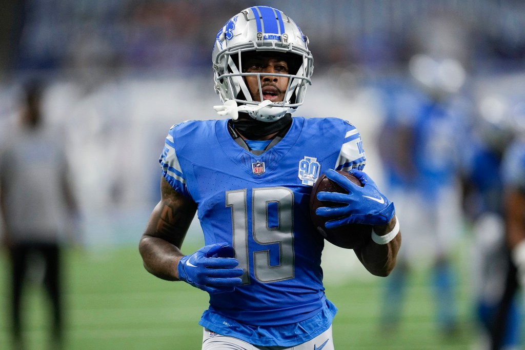 Detroit Lions wide receiver Trinity Benson (19) runs the ball ahead of a preseason game in August 2023.