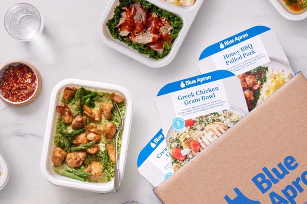 A group of containers filled with food from Blue Apron