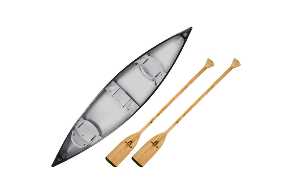 A canoe and paddles on a white background