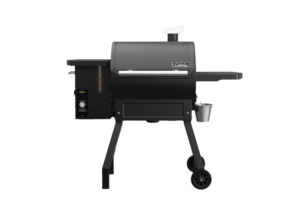 A black barbecue grill with a bucket on it