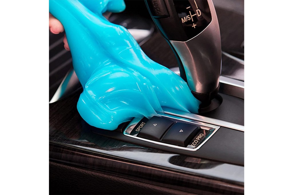 A blue slime being used for car cleaning