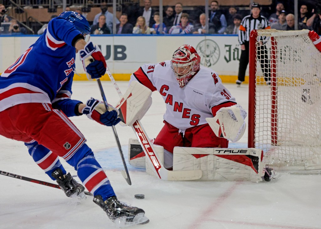 Hurricanes goalie Frederik Andersen (31) tries to make a save against the Rangers' Will Cuylle (50) during Game 2 on Tuesday.