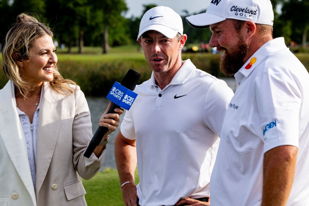 CBS Sports reporter Amanda Balionis talks to Shane Lowry and Rory McIlroy after winning the Zurich Classic of New Orleans golf tournament on April 28, 2024.