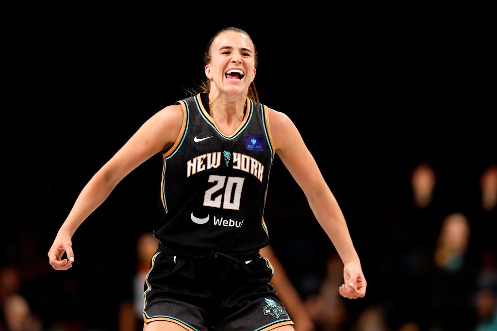 Sabrina Ionescu (20) celebrates after scoring against the Seattle Storm during the second half at the Barclays Center. 