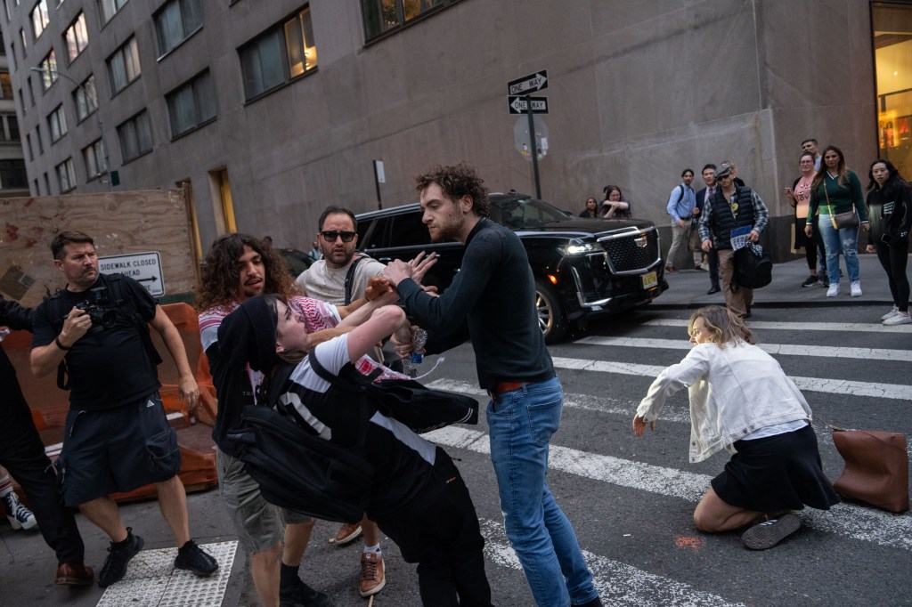 A pro-Israel supporter clashes with anti-Israel protesters in Manhattan on May 21. 2024.