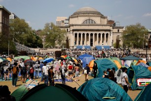 Student protesters gather inside their encampment on the Columbia University campus, on April 29, 2024, in New York.