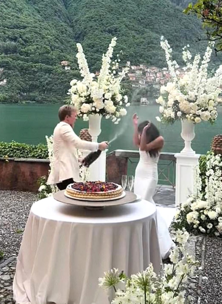 The internet went out of control when a bride got drenched in champagne from her husband.