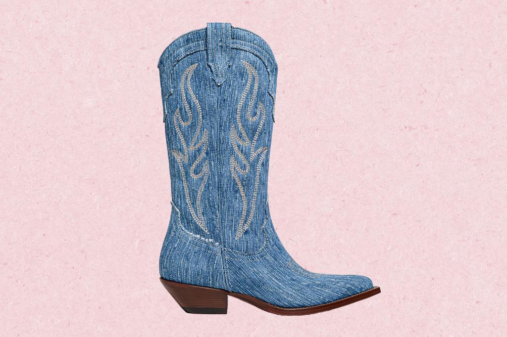 A blue cowboy boot with white embroidery