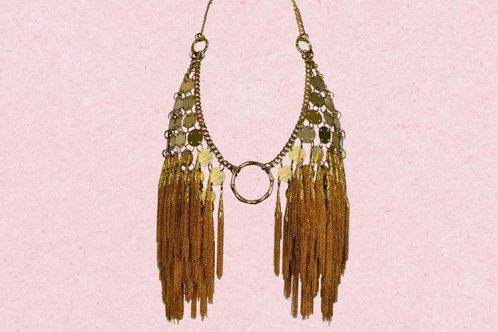 A gold necklace with tassels