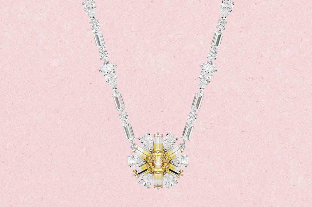 A necklace with a flower shaped pendant