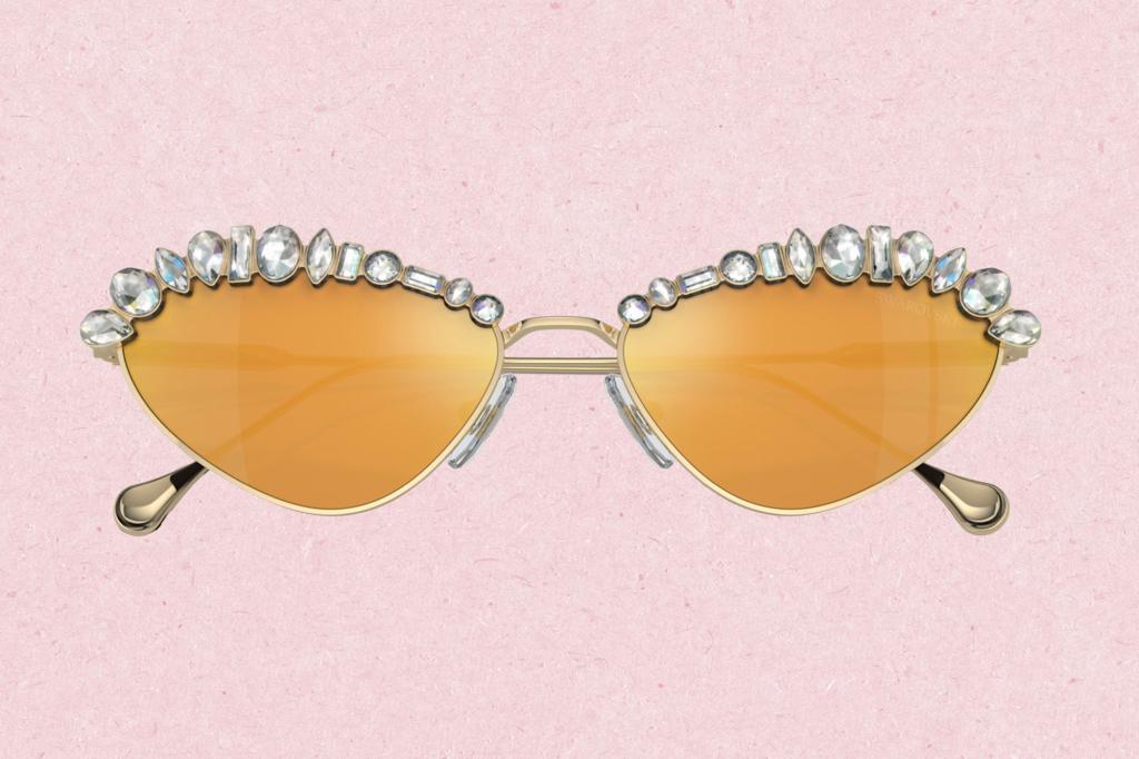 A pair of sunglasses adorned with crystals, hinting a cowgirl style