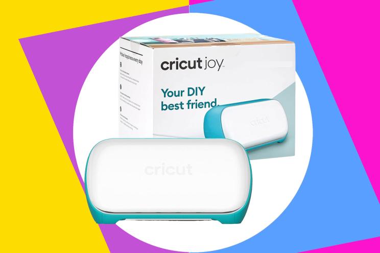 A box and two blue and white objects, possibly related to the Cricut Joy crafting tool