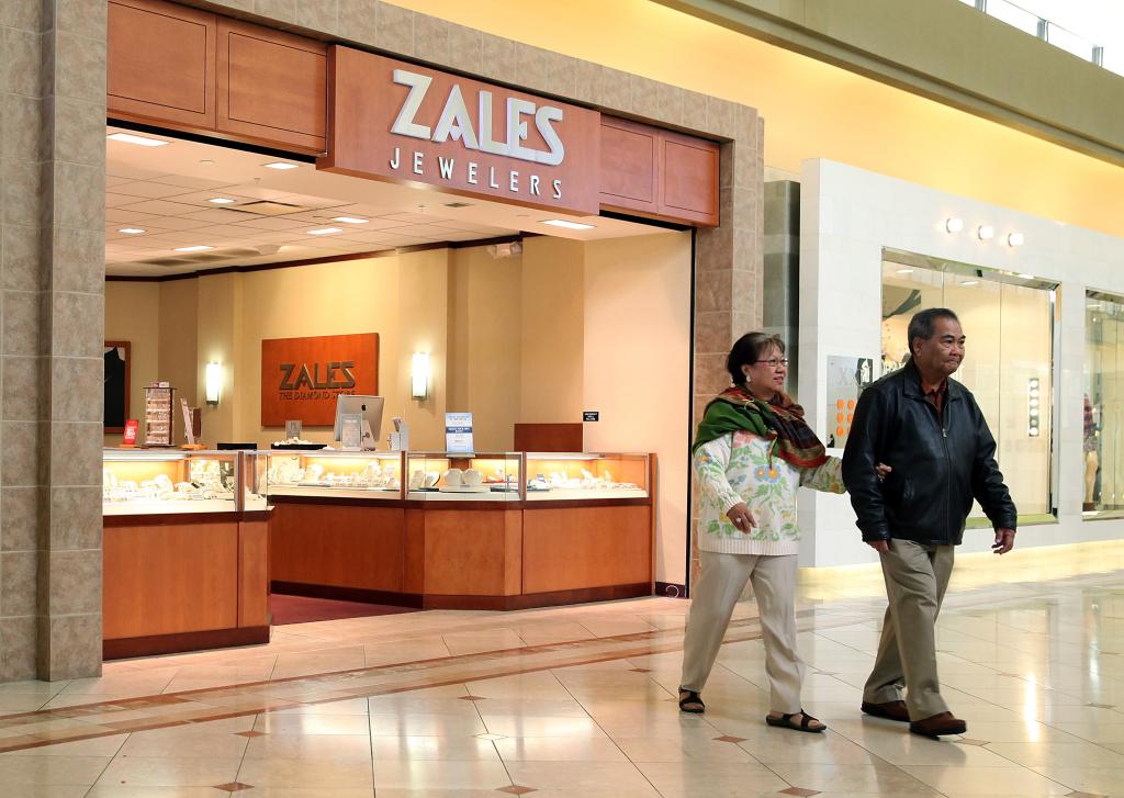 Customers exiting a Zales Jewelers store at Serramonte Mall, Daly City, CA after Signet Jewelers' acquisition announcement