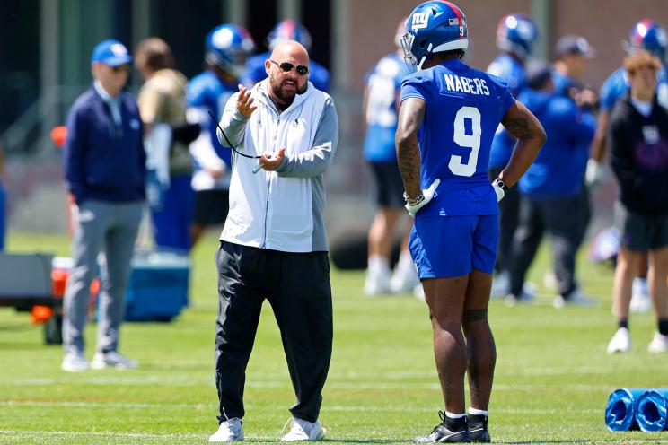 New York Giants head coach Brian Dabol talks to wide receiver Malik Nabers during Rookie Minicamp, Saturday, May 11, 2024 in East Rutherford, N.J.