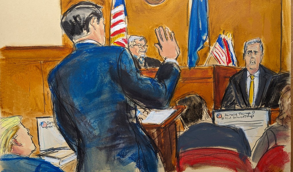 Defense attorney Todd Blanche making a swearing-in gesture in a courtroom with Donald Trump watching and Judge Juan Merchan presiding