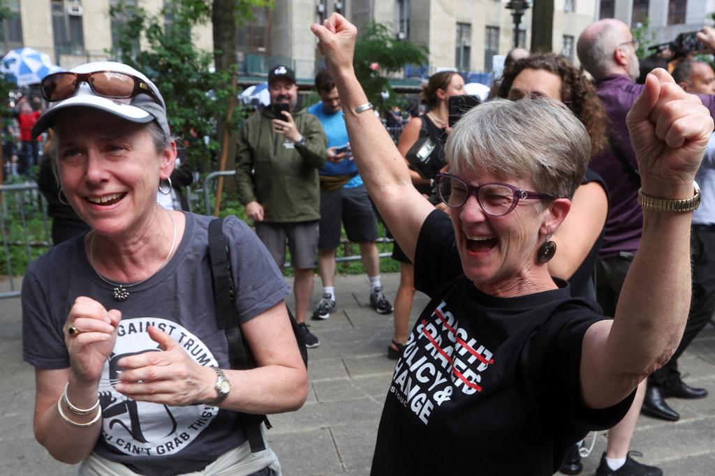 Demonstrators celebrate outside Manhattan criminal court following the verdict in former U.S. President Donald Trump's criminal trial over charges that he falsified business records to conceal money paid to silence porn star Stormy Daniels.