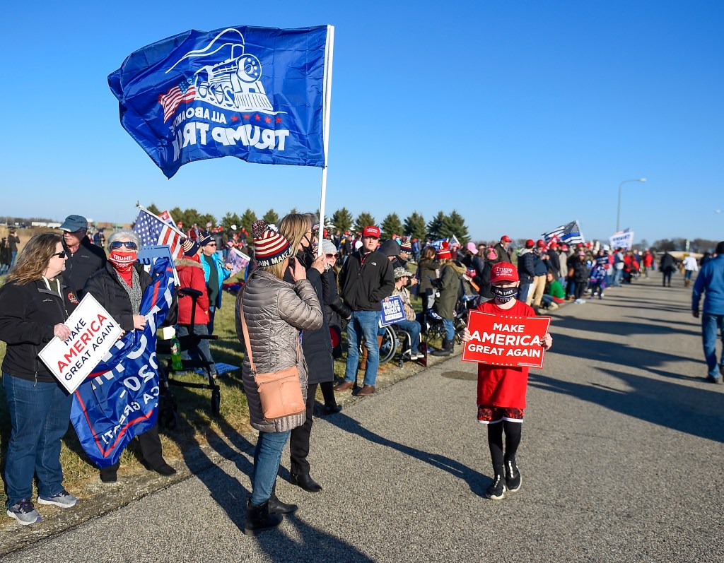 Supporters gather at the Rochester International Airport before US President Donald J. Trump arrives during a campaign rally in Rochester, Minnesota, USA, 30 October 2020. 
