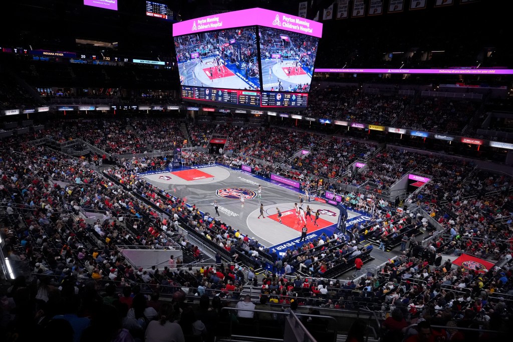 Fans watch in the first half of a WNBA basketball game between the Indiana Fever and the New York Liberty