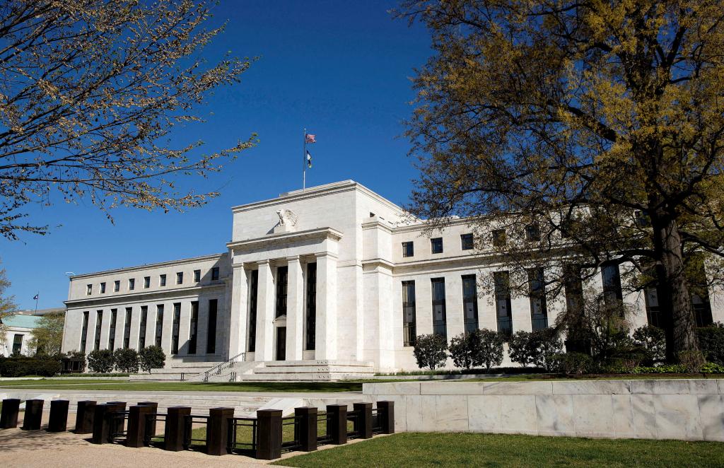 The Federal Reserve Building in Washington, a white structure with a flag on top, taken on April 3, 2012