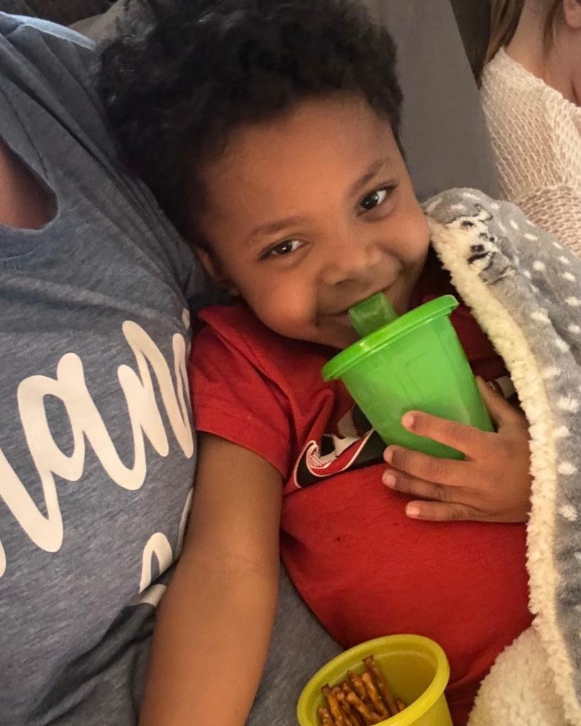 Five-year-old boy Ezra Toczek drinking from a green cup, his former preschool teacher has offered him the hope of a liver transplant