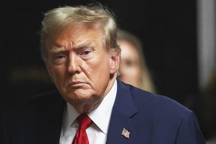 Former U.S. President Donald Trump in suit and tie at Manhattan Supreme Court during his hush money trial on May 16, 2024