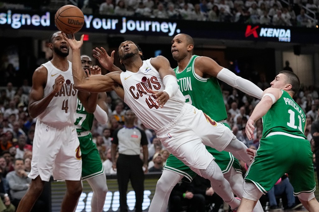 Donovan Mitchell (45) is fouled during the Cavaliers' Game 3 loss to the Celtics on Saturday.