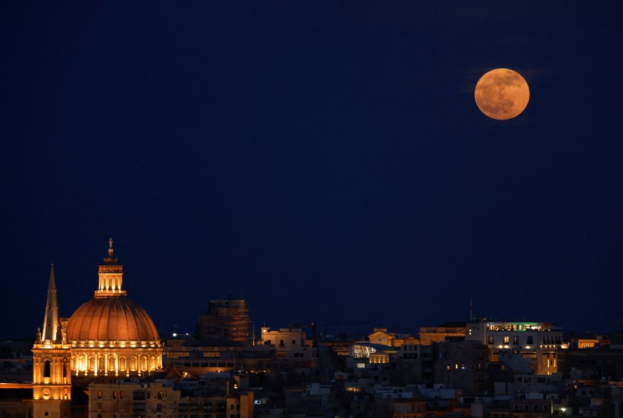 Flower moon rises over Valletta, Malta.