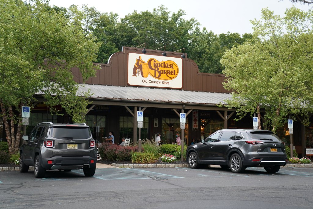 Exterior view of Cracker Barrel Old Country Store with cars parked out front in Mount Arlington, NJ, August 24, 2020