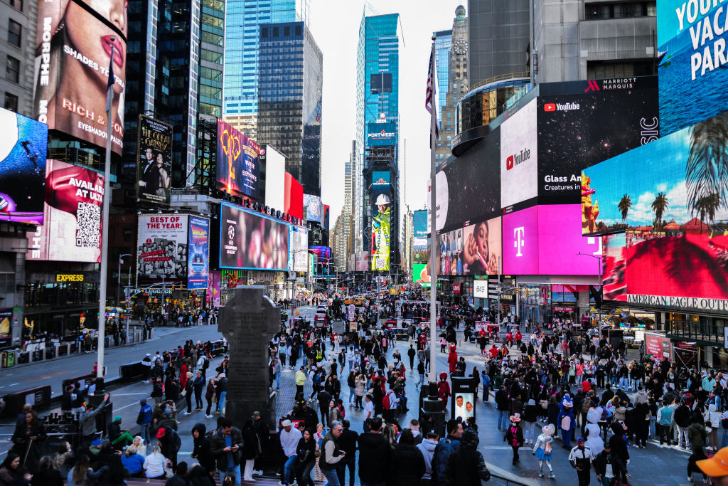 A general view shows visitors and tourists making their way through Times Square in New York City on April 7, 2024. (Photo by Charly TRIBALLEAU / AFP) (Photo by CHARLY TRIBALLEAU/AFP via Getty Images)