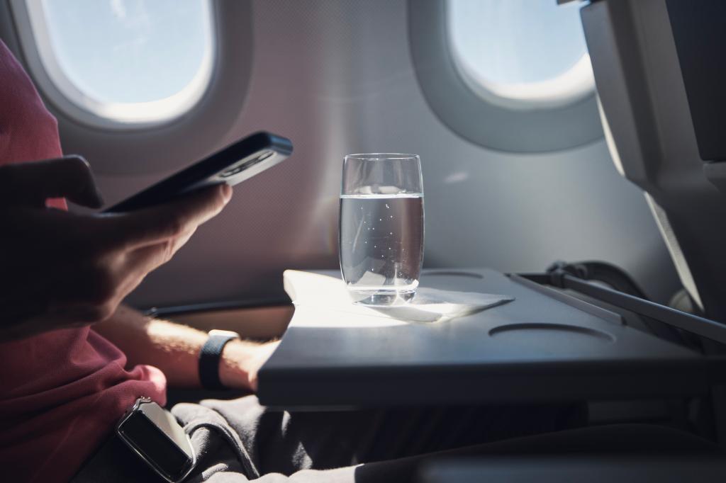 closeup of water glass on a plane