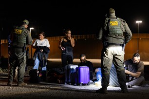 Border Patrol agents apprehending migrants in Yuma, Arizona on May 16, 2024.