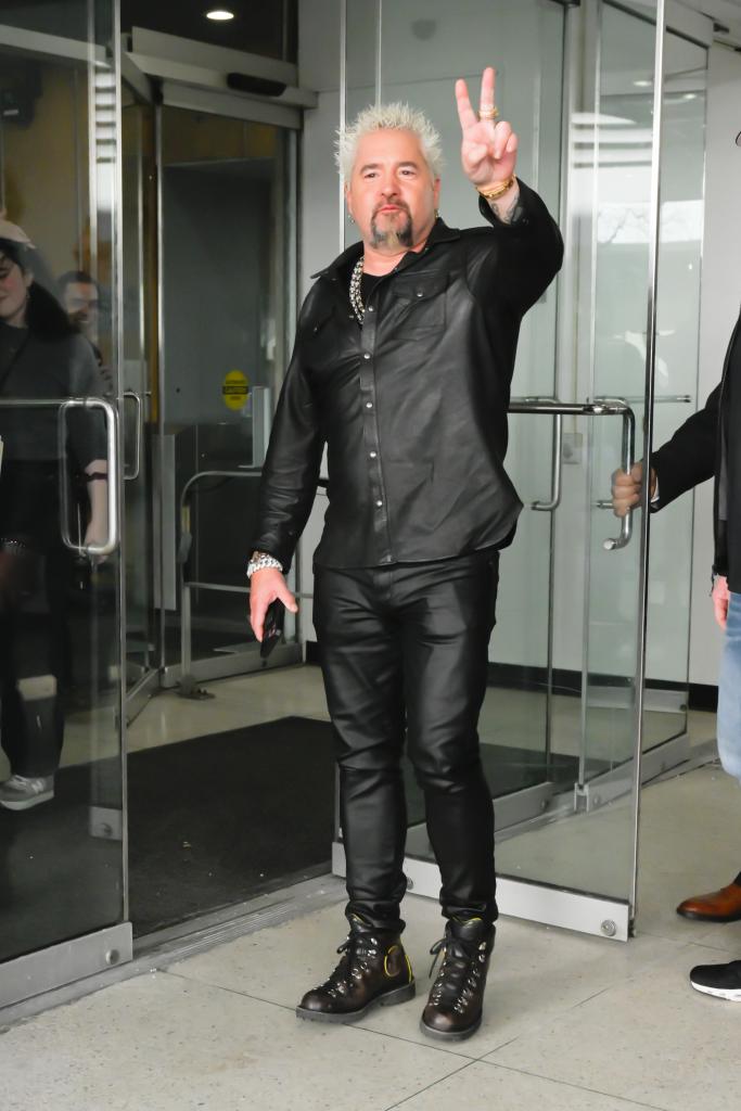 Fieri is seen walking in Midtown Manhattan on Feb. 20, 2024.