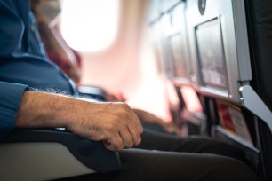 Stock image of a seated passenger.