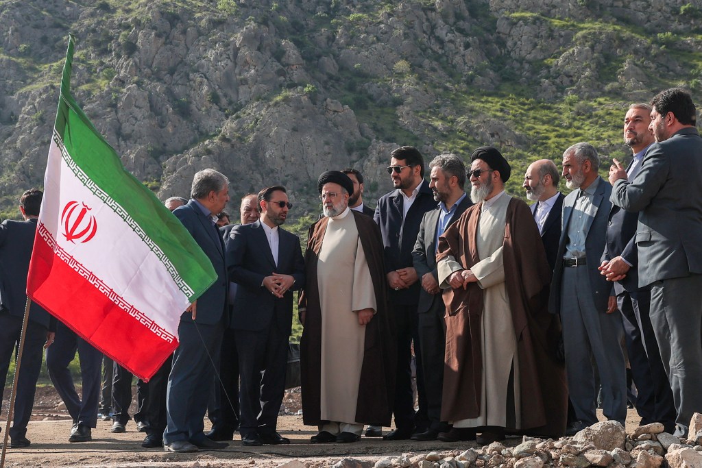 Iranian president Ebrahim Raisi visiting a proposed road and rail bridge project over the Aras River in Jolfa, Iran, before his helicopter crash