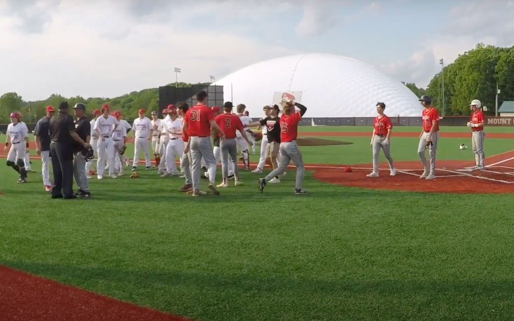 The call wiped away three runs that would have scored and became the final out, handing Mount Olive a 3-0 win. 