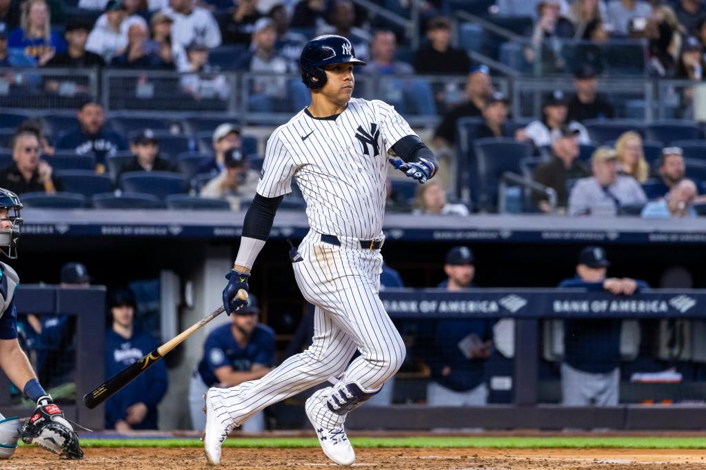 New York Yankees outfielder Juan Soto hitting a single in the fifth inning at Yankee Stadium