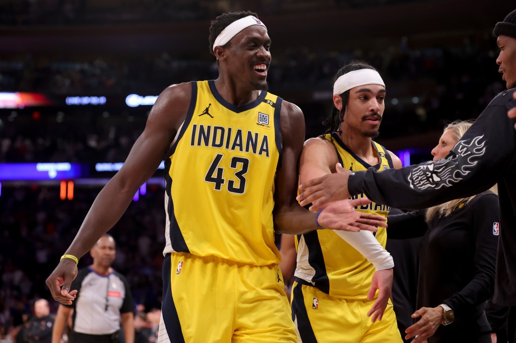 Pacers forward Pascal Siakam (43) and guard Andrew Nembhard (2) celebrate with teammates during the fourth quarter on Sunday.