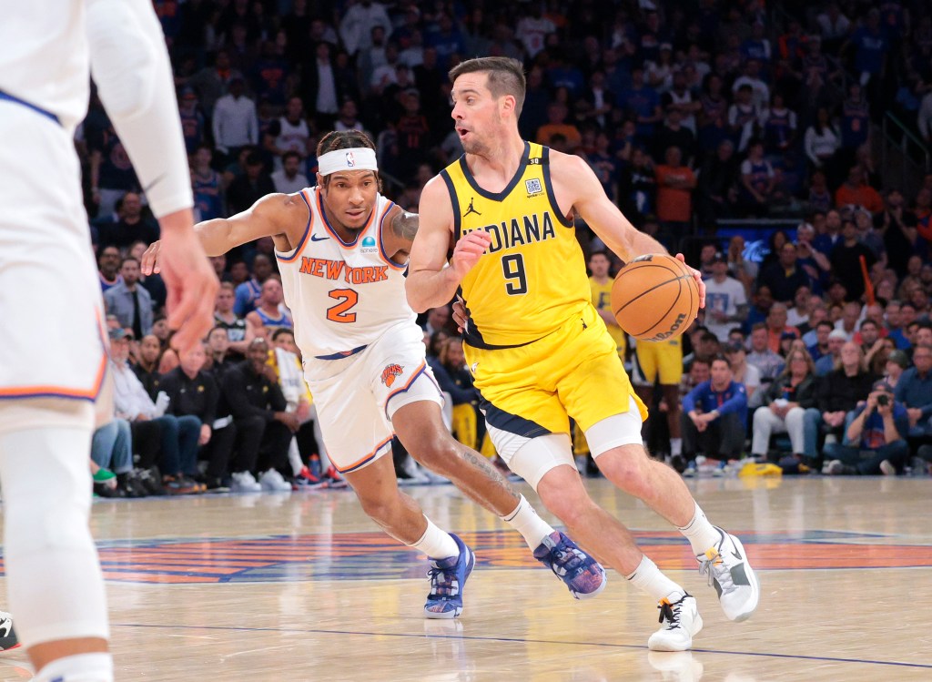 T.J. McConnell #9 drives down court as New York Knicks guard Miles McBride #2 gives chase during the third quarter.