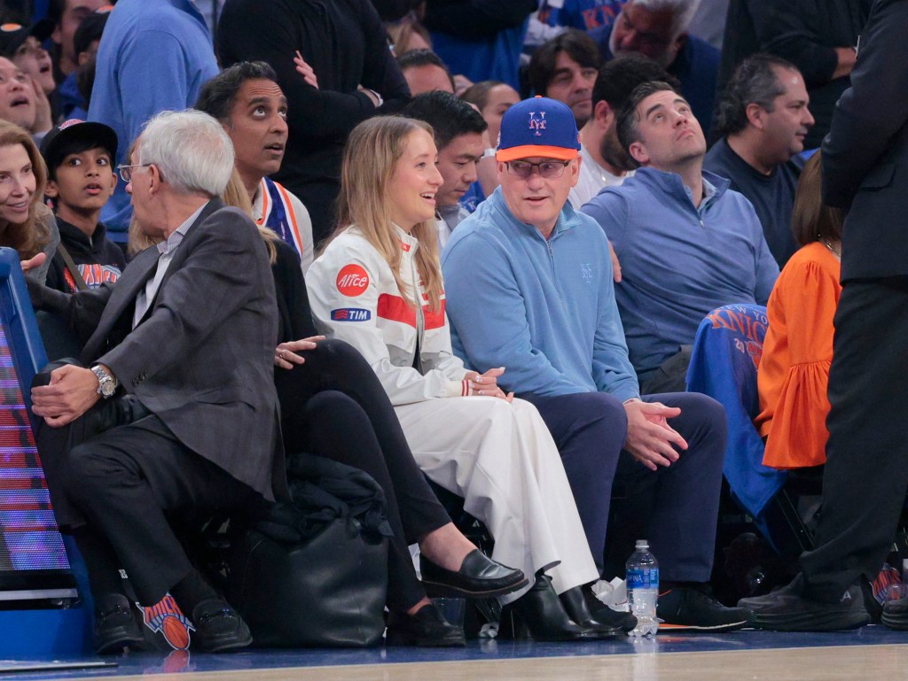 New York Mets owner Steve Cohen sits on celebrity row during the first quarter.