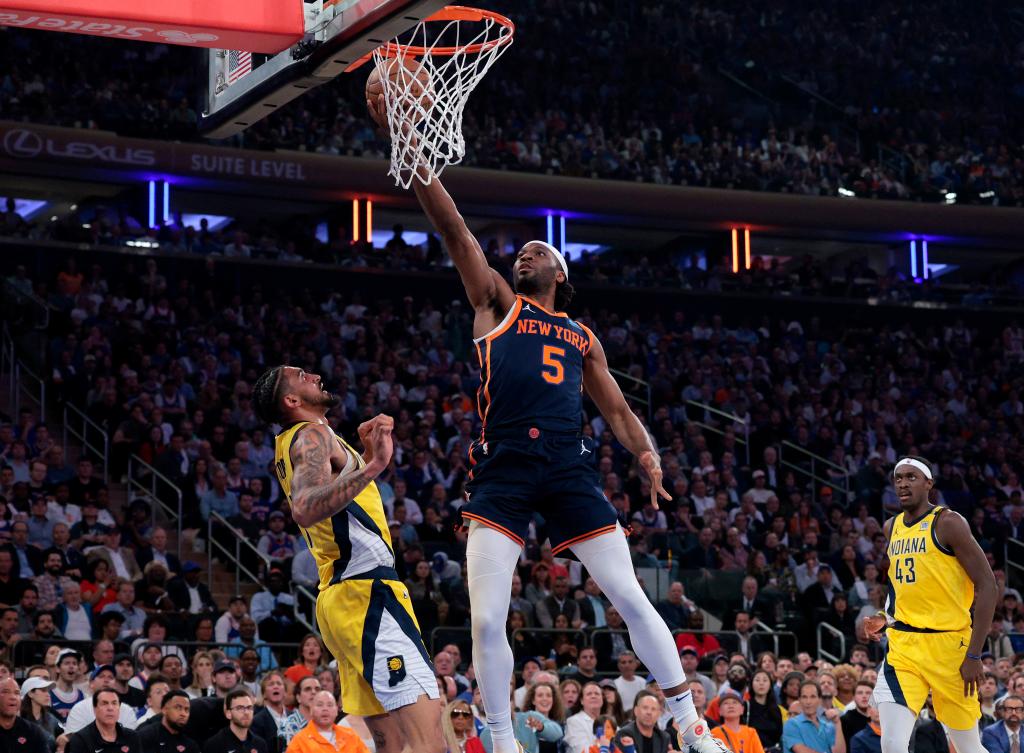 Precious Achiuwa scores during the Knicks' Game 2 win over the Pacers on May 8, 2024. 