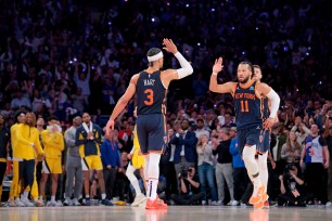 Jalen Brunson (R.) and Josh Hart celebrate during the Knicks' Game 2 win over the Pacers on May 8, 2024. 