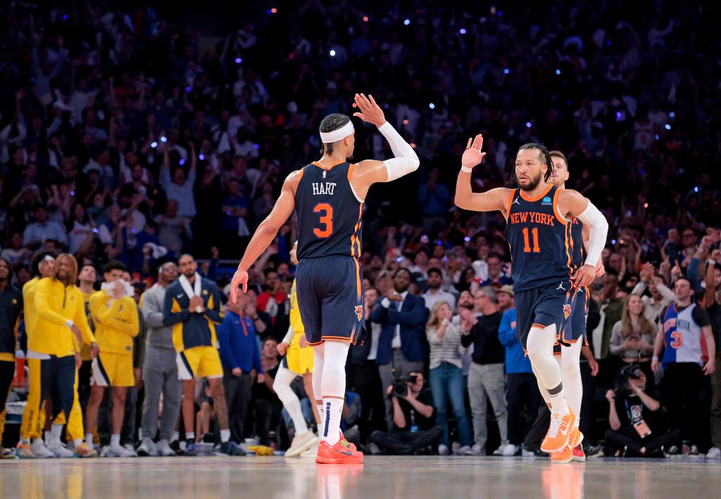 Jalen Brunson (R.) and Josh Hart celebrate during the Knicks' Game 2 win over the Pacers on May 8, 2024. 