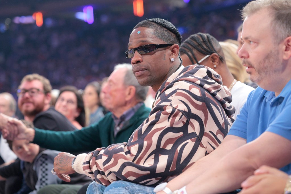 Rapper Travis Scott sitting courtside for Sunday's Game 7 at the Garden.