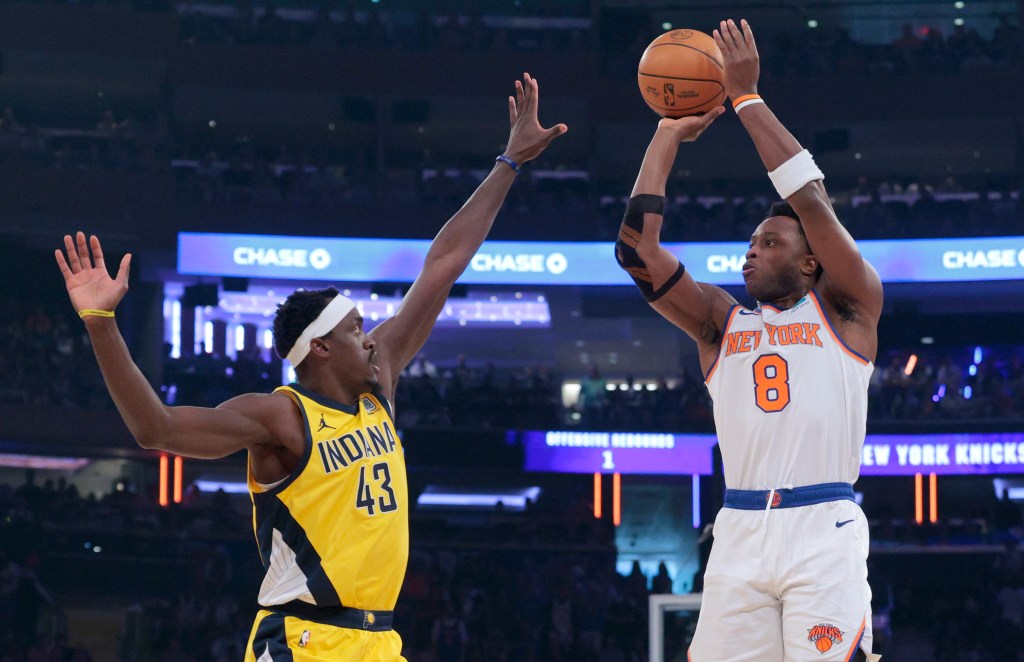 OG Anunoby #8 hits a three point shot over Indiana Pacers forward Pascal Siakam #43 during the first quarter.