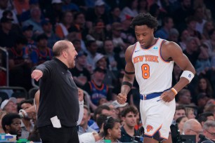 OG Anunoby goes to the Knicks' bench in the first quarter on Sunday.